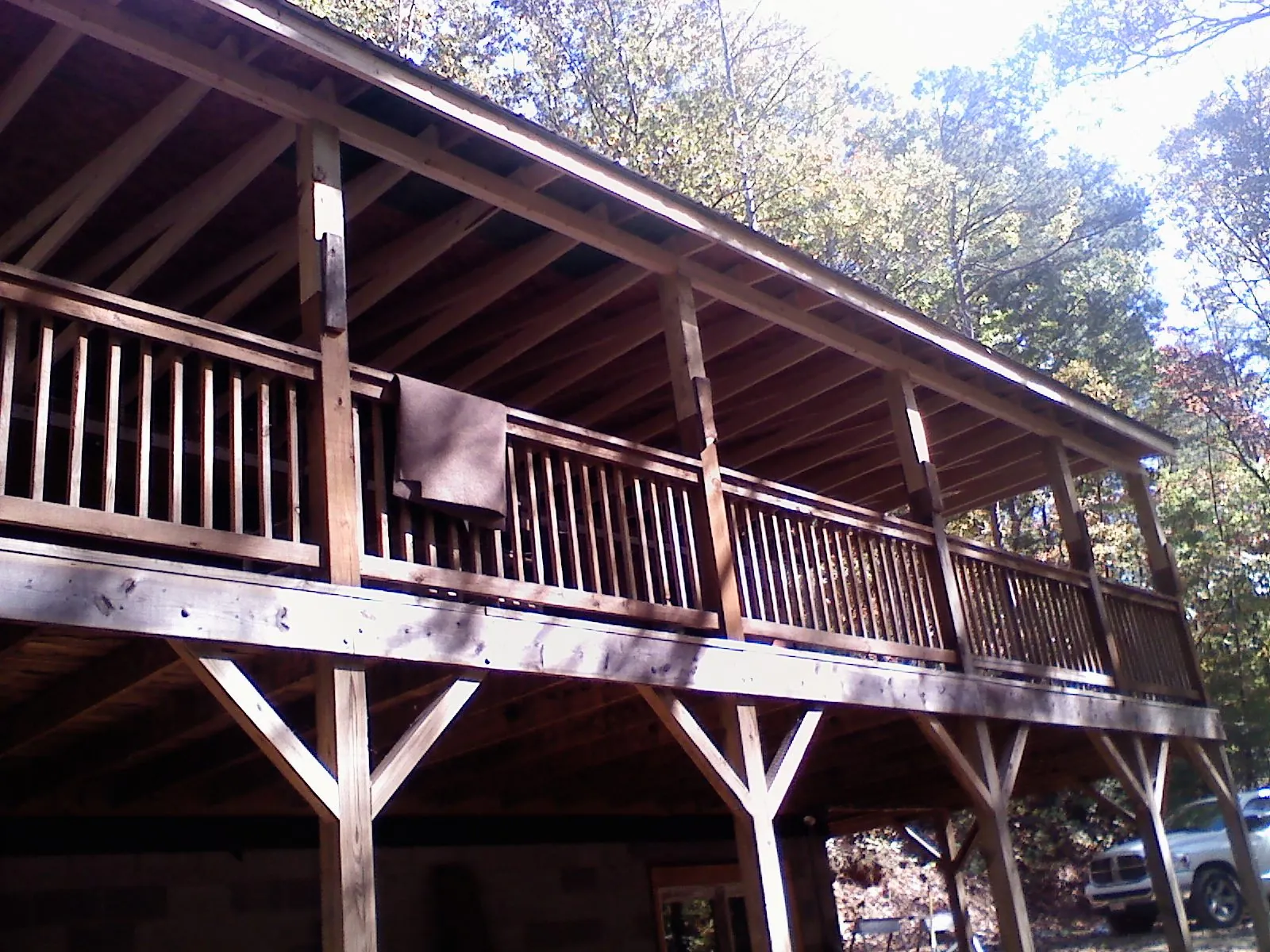 Timber framing under a new elevated porch and deck — Roof Leak Repair in Belle Plaine by Roofing Brothers